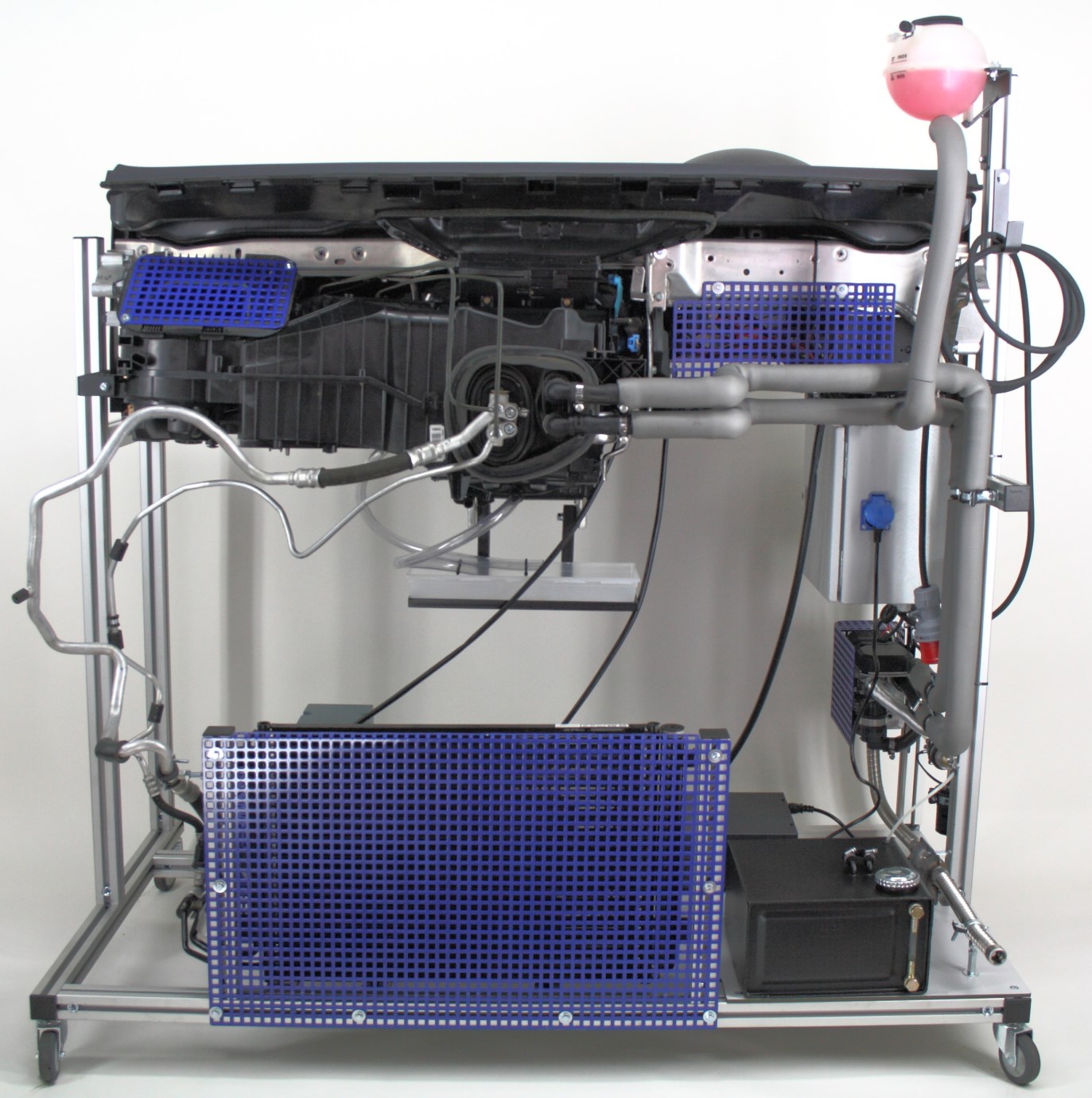 Rear view of the VW Climatronic training rig with protective grilles